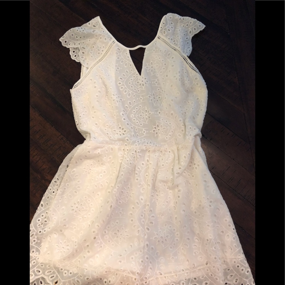 Woman’s Express white lace romper.